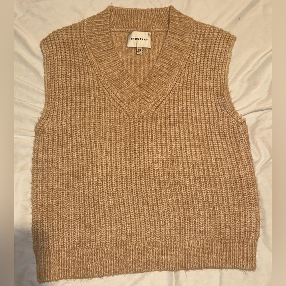 Pink sweater vest